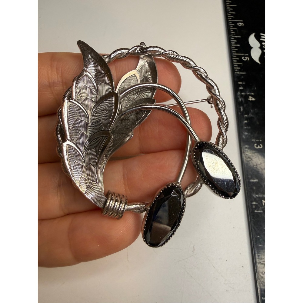 Silver Tone Wreath Brooch with Black Marquise Stones and Textured Leaves